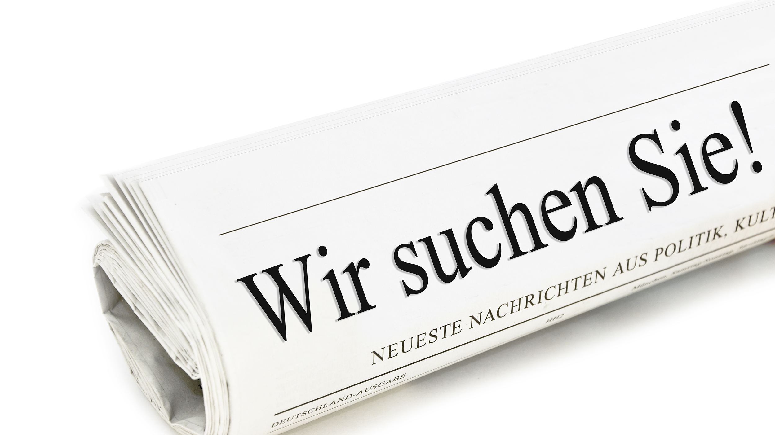 Aufgerollte Zeitung mit der Schlagzeile Wir suchen Sie